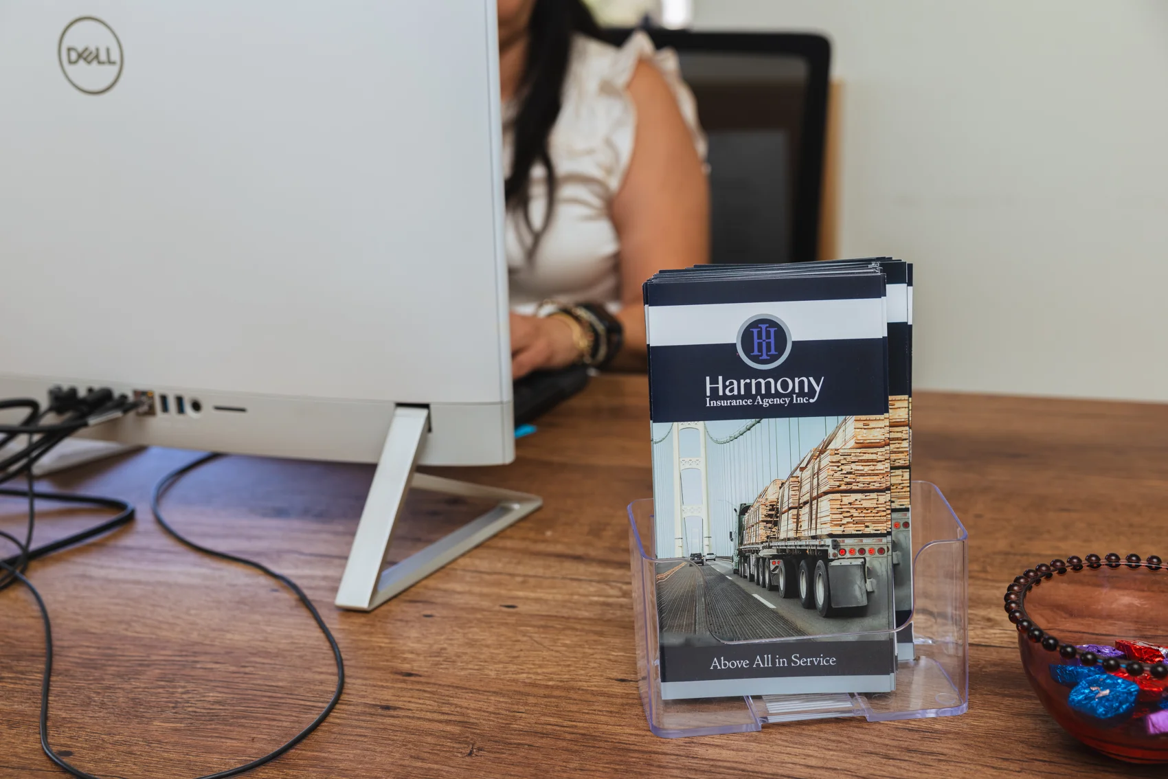 Harmony Insurance printed marketing materials photographed as a brand detail